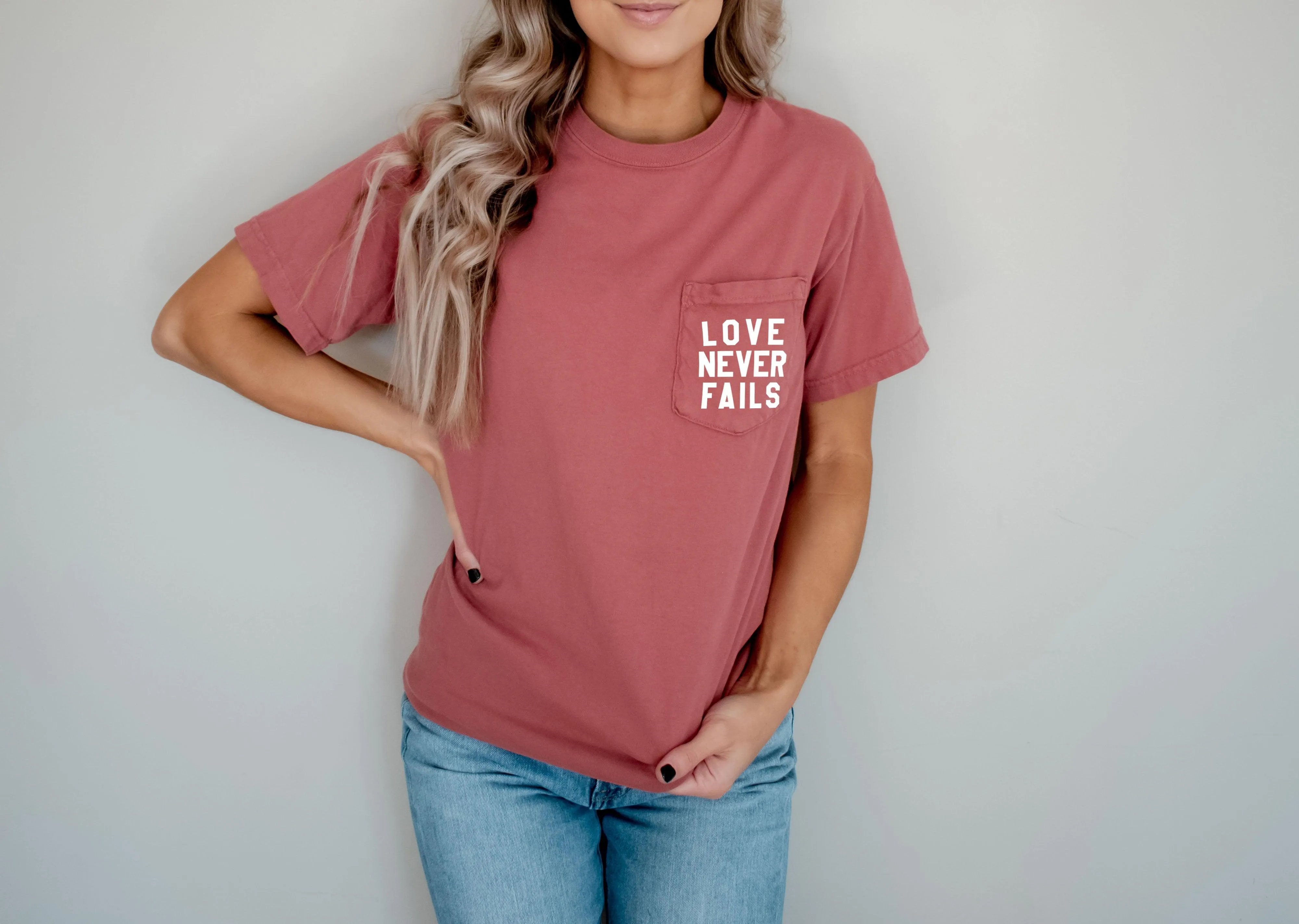 Love Never Fails Christian Comfort Colors Pocket T Shirt